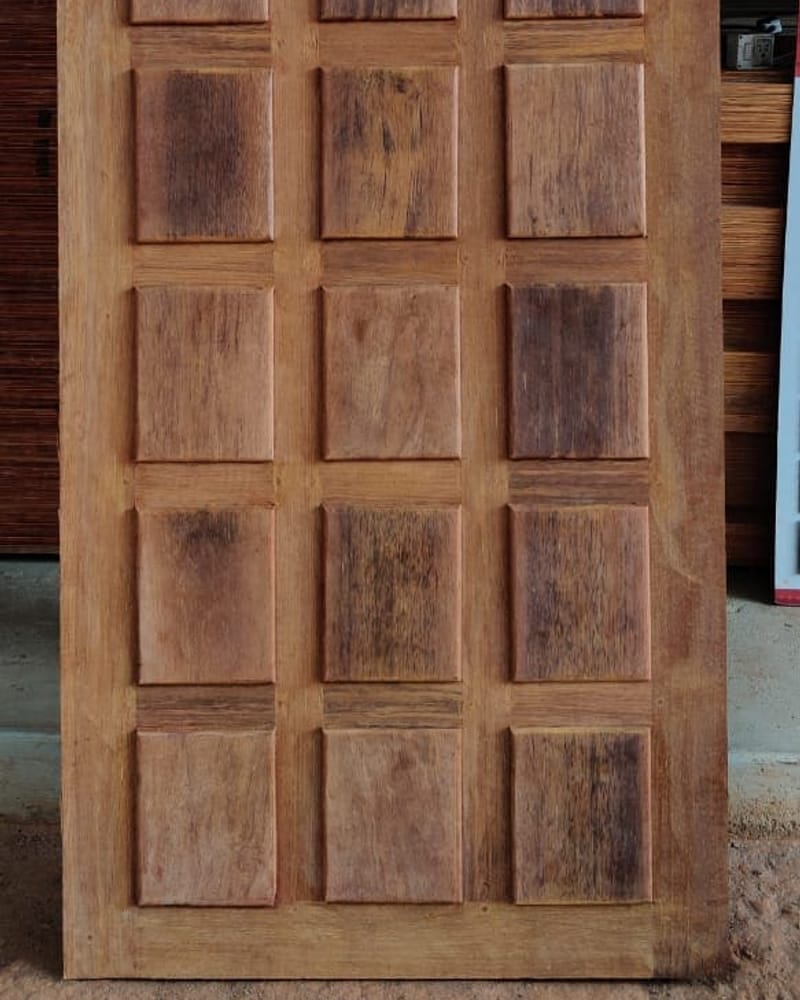 Carved teak wooden door